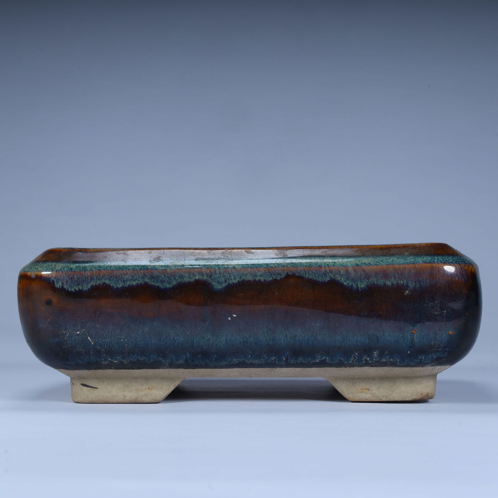 A Qing Dynasty kiln glazed rectangular flower pot: Qing Dynasty kiln glazed rectangular flower pot SIZE: H:6.5cm L:19cm W:12.5cm W:577g (The Dimensions Of All Batches Are Manually Measured.If You Need More Detailed Information, Please Contact Our Cust