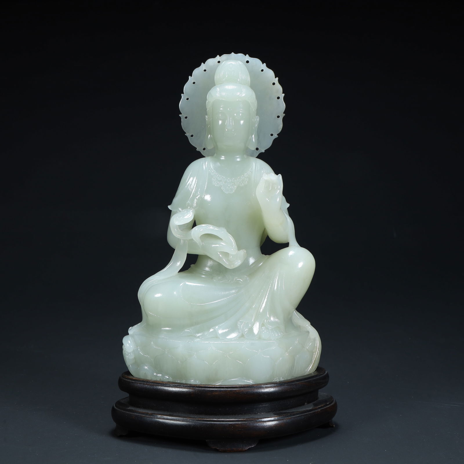 A seated statue of Guanyin in Hetian jade (1 of 12)