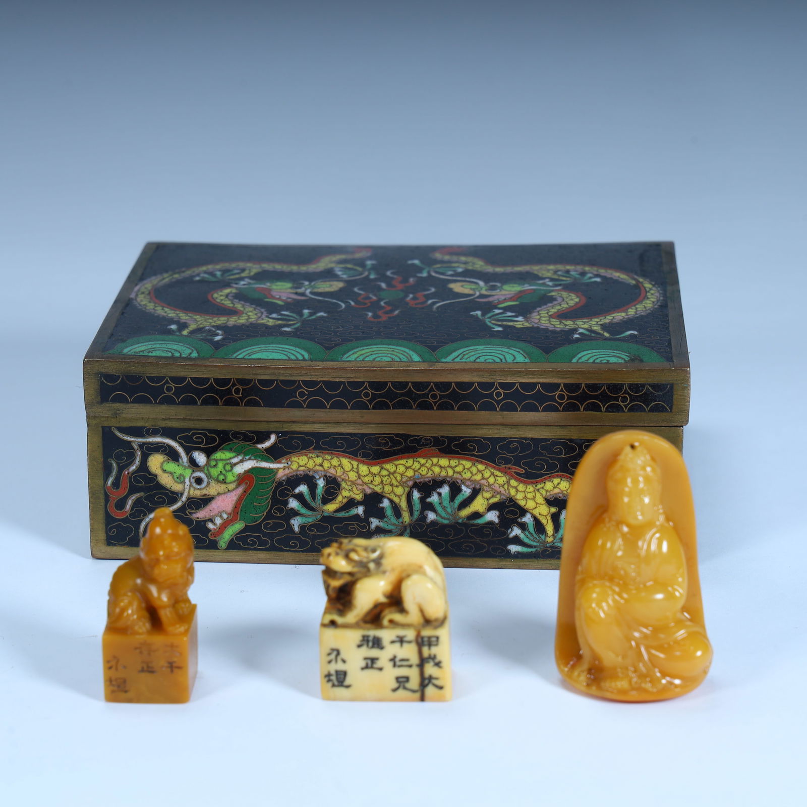 A Qing Dynasty cloisonné enamel dragon pattern box and Shoushan stone play (seal, Guanyin statue) (1 of 19)