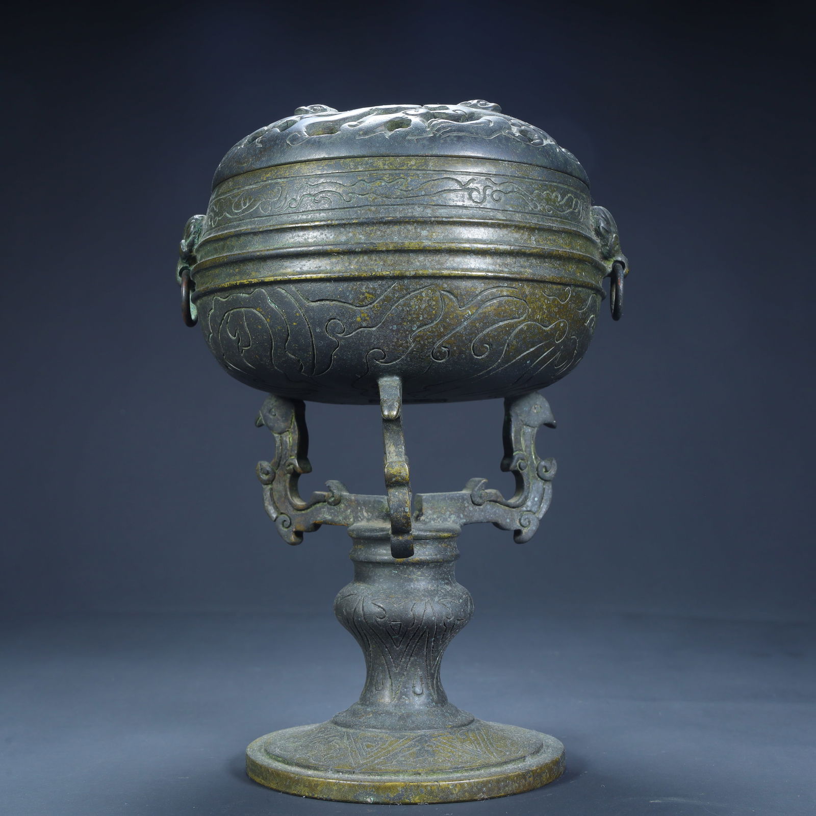 A Qing Dynasty bronze high-foot smoker: Qing Dynasty bronze high-foot smoker SIZE: H:22cm L:15.5cm W:14cm W:3.6kg (The Dimensions Of All Batches Are Manually Measured.If You Need More Detailed Information, Please Contact Our Customer