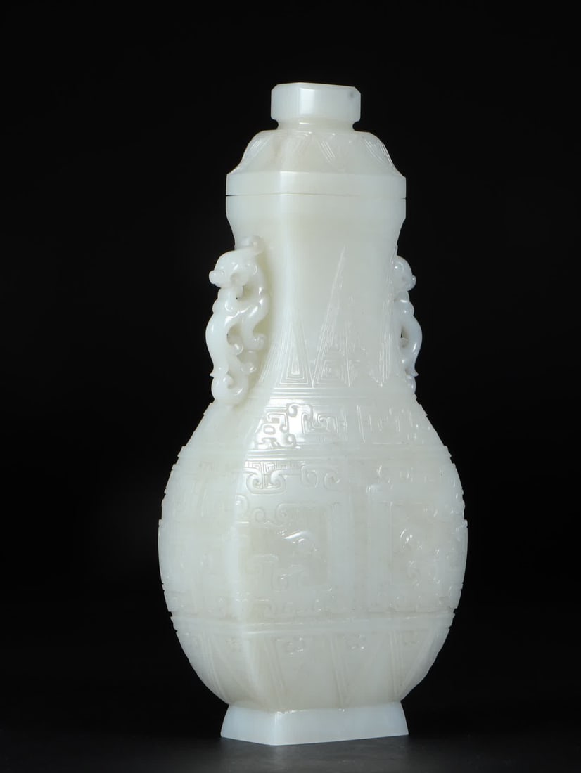 A Qing Dynasty Hetian jade white jade gluttonous pattern double phoenix ear bottle - 2