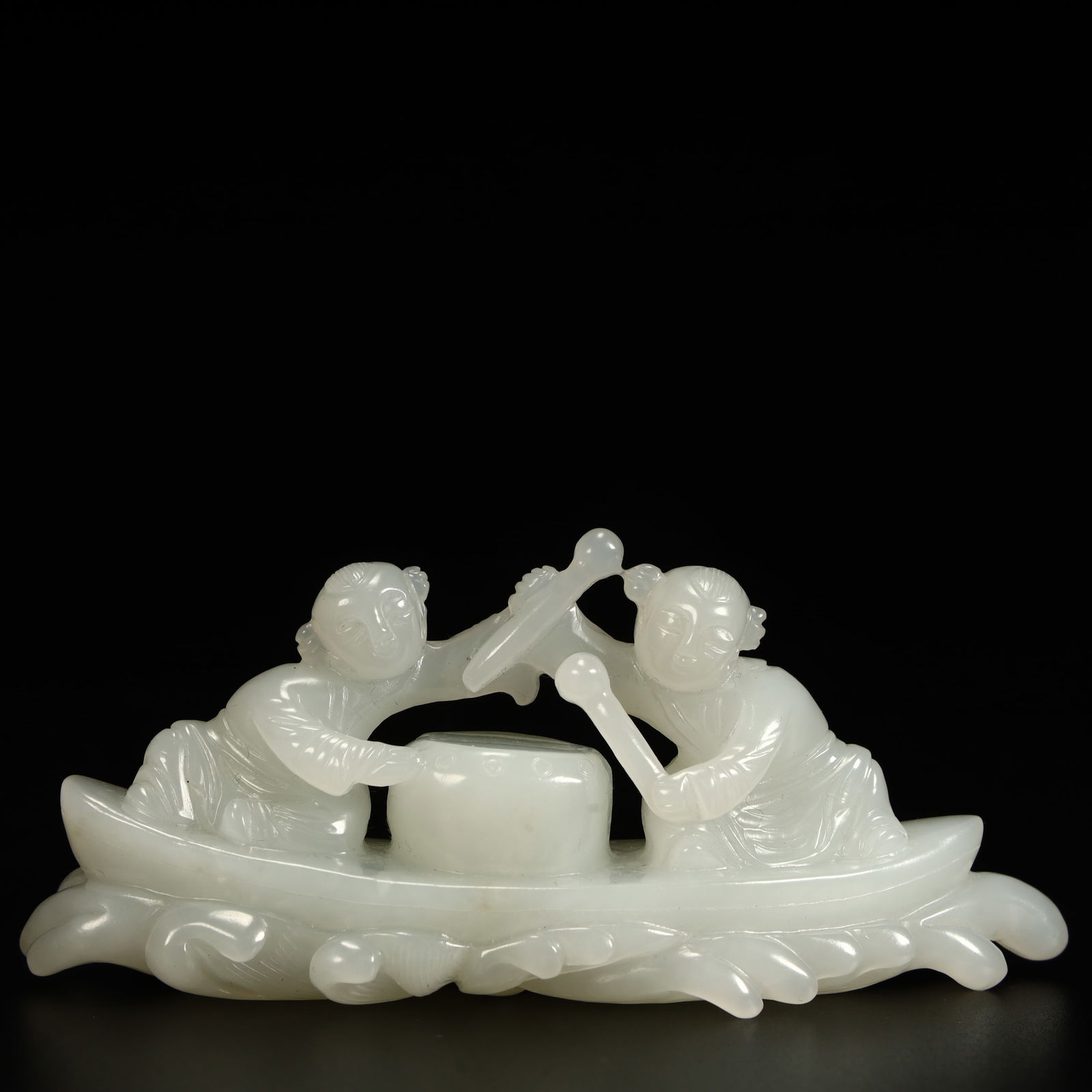 A Qing Dynasty Hetian jade boy ornament (1 of 9)