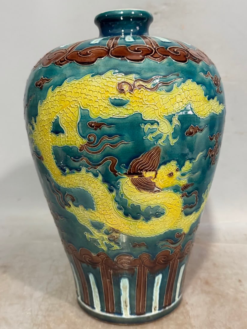 A Ming Dynasty enamel peacock blue ground yellow dragon pattern plum bottle: Ming Dynasty enamel peacock blue background yellow dragon pattern plum bottle SIZE: H:32.5cm W:22cm (The Dimensions Of All Batches Are Manually Measured.If You Need More Detailed Information,