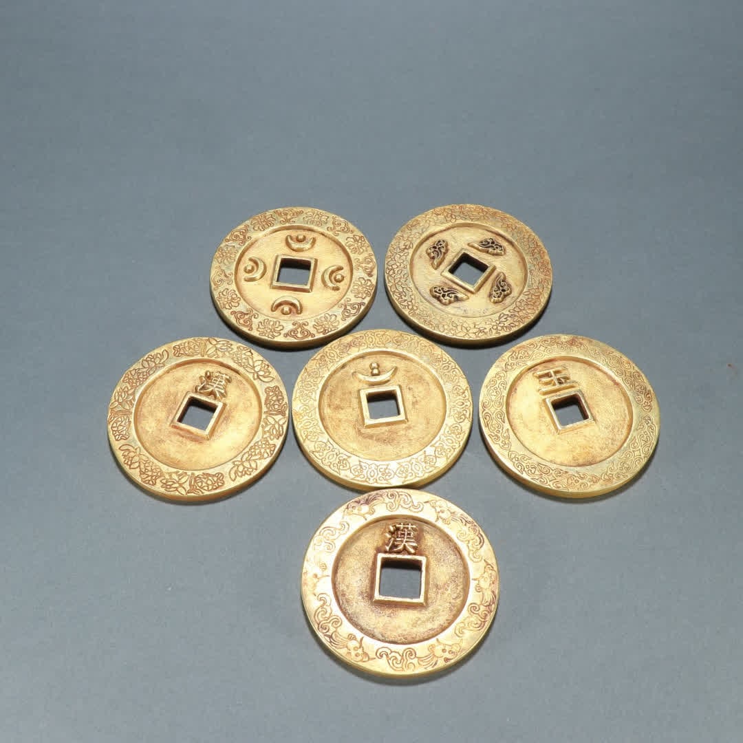 A set of Qing Dynasty copper gilt Five Emperors coins (1 of 9)