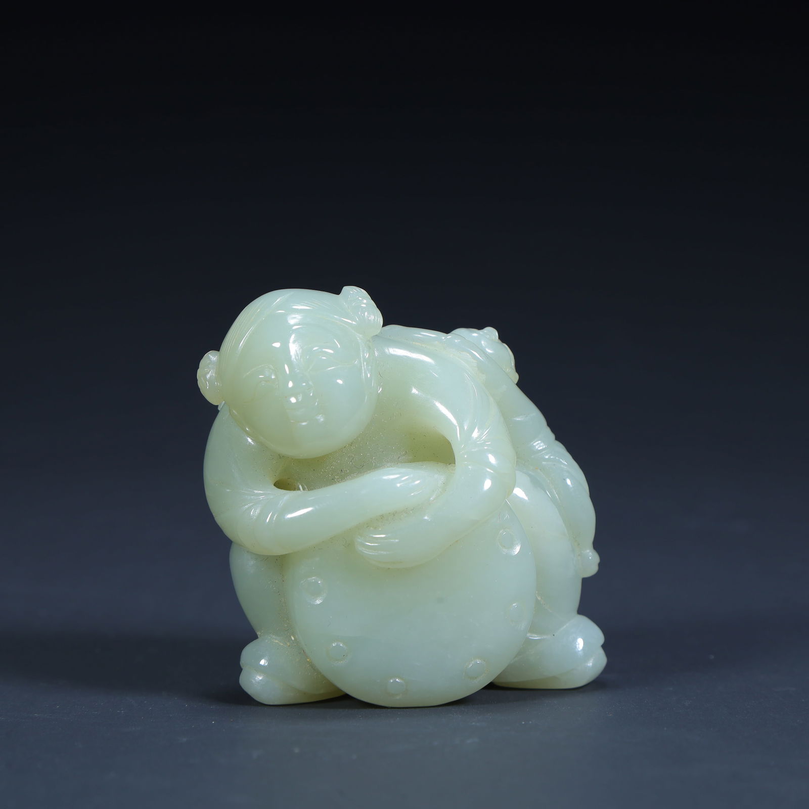 A Qing Dynasty Hetian jade drum boy ornament (1 of 9)
