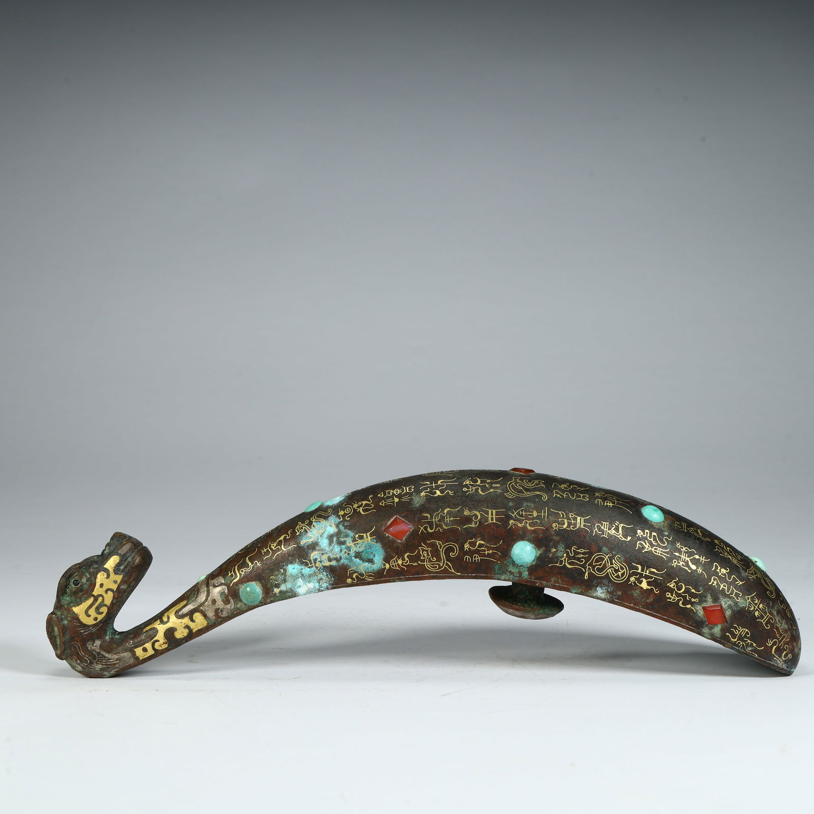 A piece of gold and silver inlaid turquoise bronze with hooks (1 of 11)