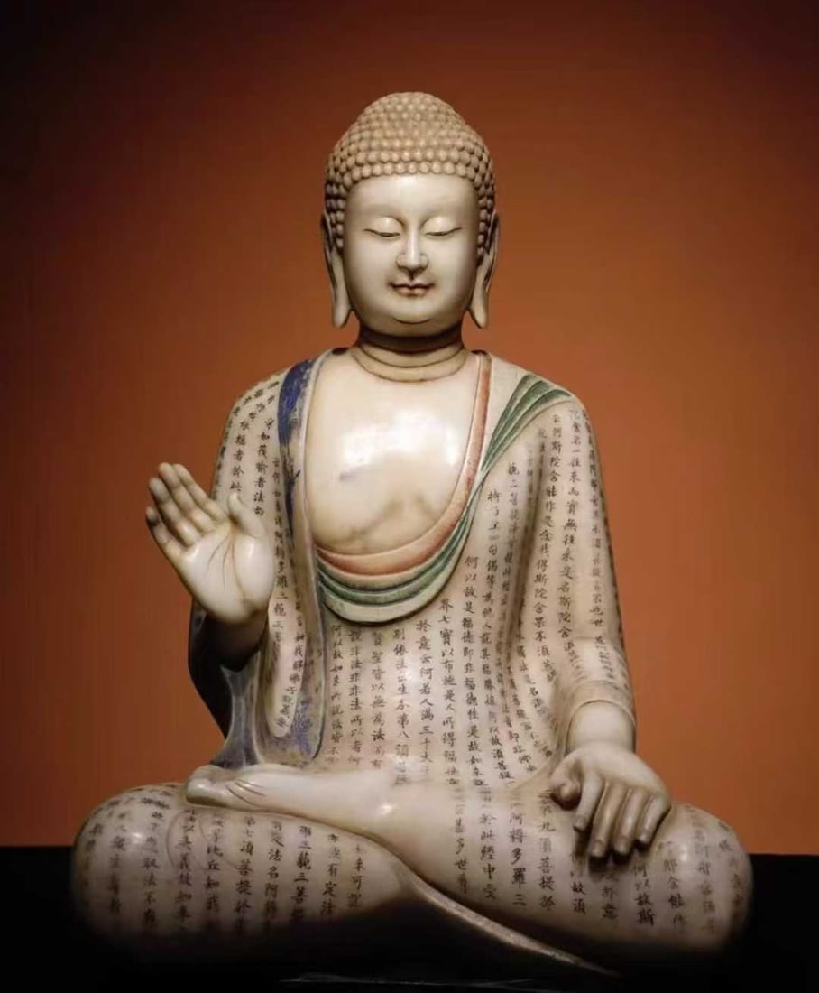 A painted Buddha statue of Tang and Han white jade: The hand-painted scriptures of the Tang and Han white jade painted Buddha statues are exquisitely crafted SIZE: H: 67cm W: 45cm thickness 35cm (The Dimensions Of All Batches Are Manually