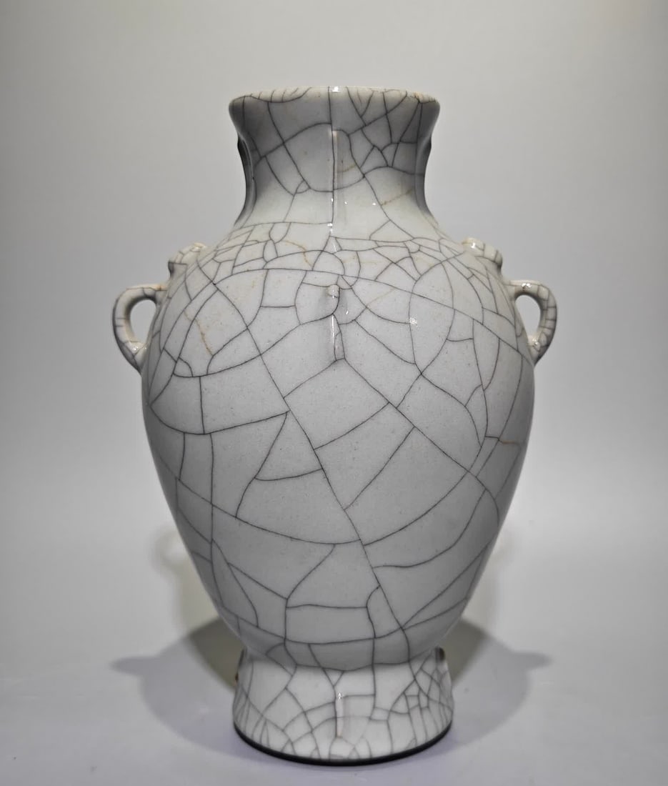 A Qianlong period official glazed multi-eared olive bottle made in the Qianlong period of the Qing: Qianlong year of the Qing Dynasty official glazed multi-eared olive bottle SIZE: H:23.5cm W:17cm (The Dimensions Of All Batches Are Manually Measured.If You Need More Detailed Information, Please