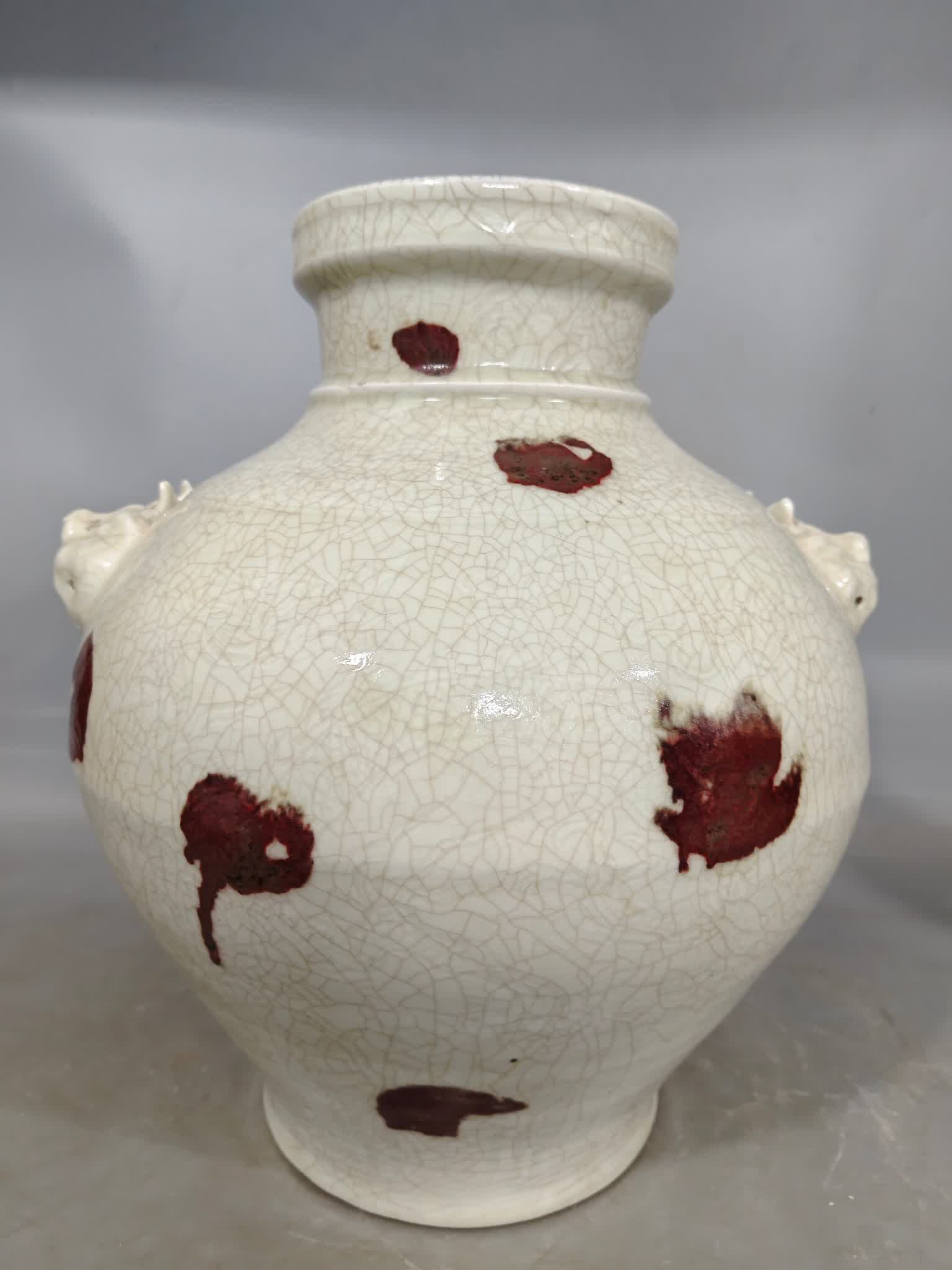 A red beast ear jar in the Qing Dynasty Ge glaze: Qing Dynasty Ge glaze glazed red beast ear jar SIZE: H:35.5cm W:27cm (The Dimensions Of All Batches Are Manually Measured.If You Need More Detailed Information, Please Contact Our Customer