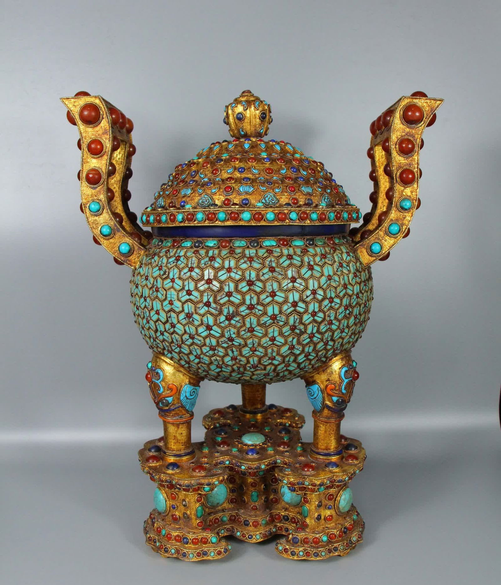 A Qing Dynasty gilded tripod inlaid with multiple gemstones (1 of 9)