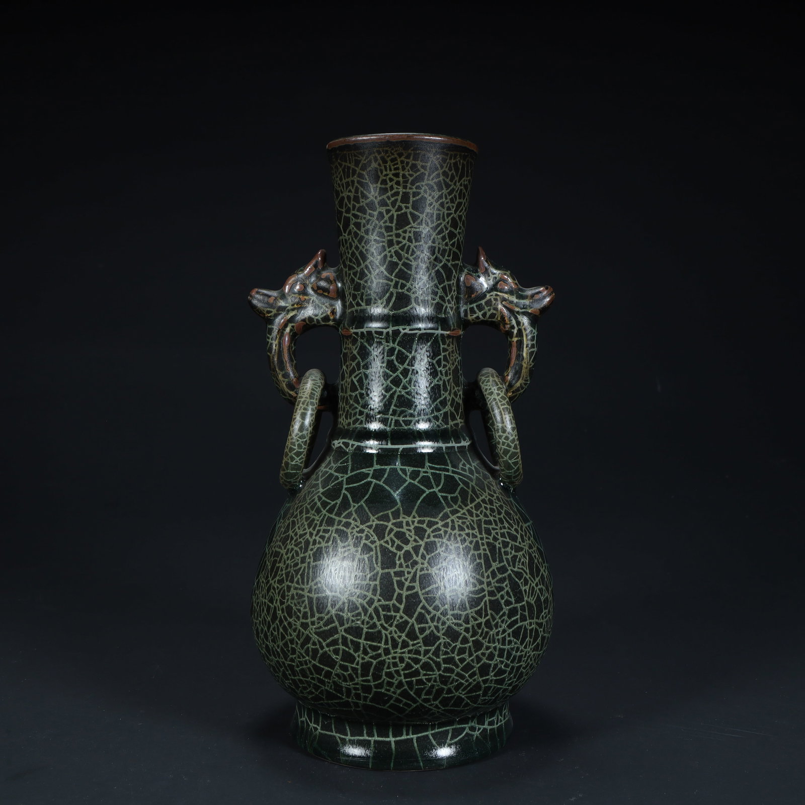 A Song Dynasty official kiln-style green glaze open-piece double dragon ear ring bottle (1 of 9)