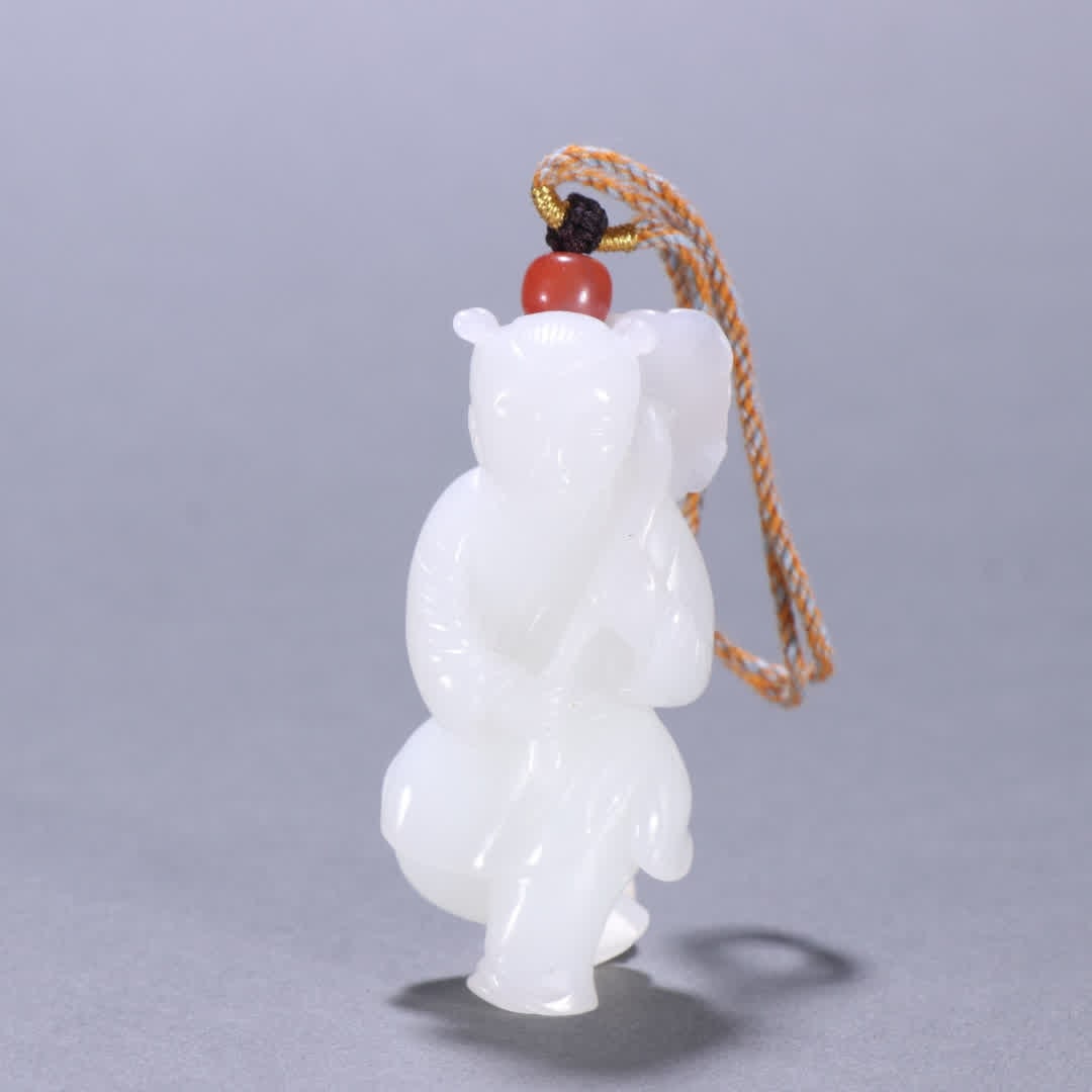 A Qing Dynasty Hetian jade boy holding a lotus carving (1 of 9)