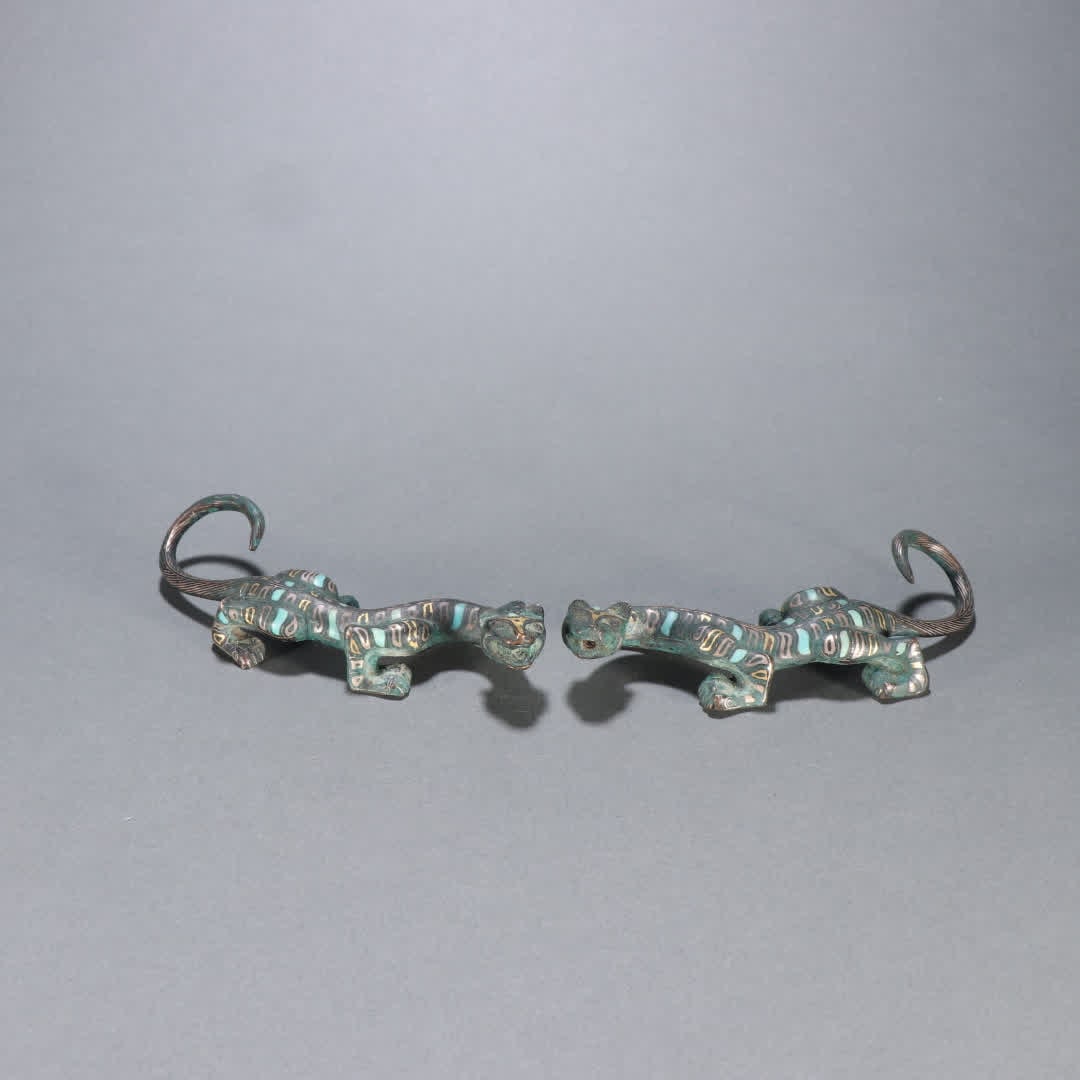 A pair of Han Dynasty bronze gold and silver inlaid turquoise dragon ornaments (1 of 9)