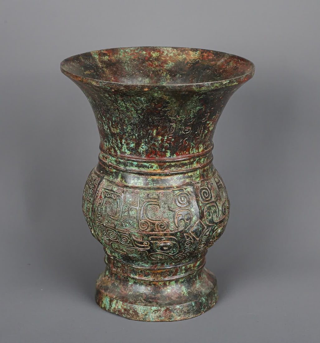 A piece of Western Zhou_bronze beast face pattern round statue (1 of 9)