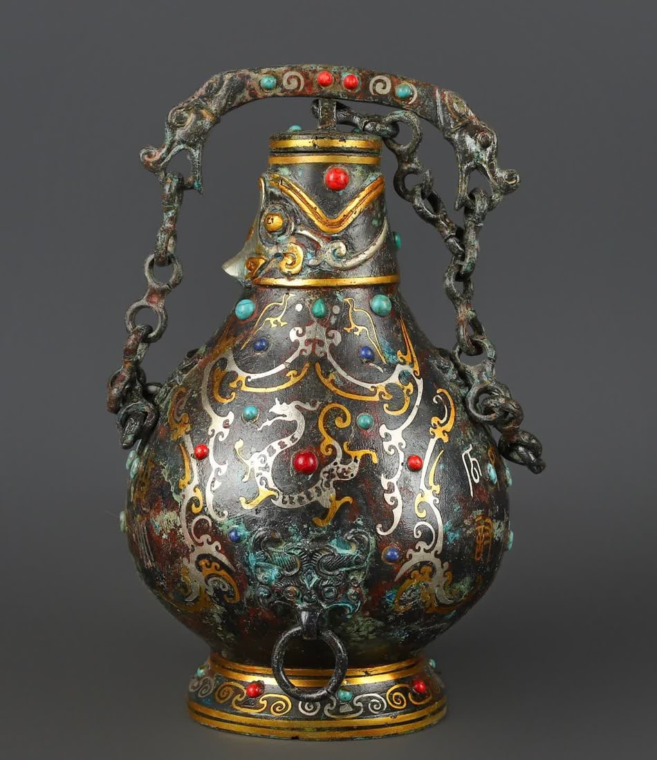 A Han Dynasty_Bronze Cuo Jinxiong inlaid gemstone chain jar (1 of 9)