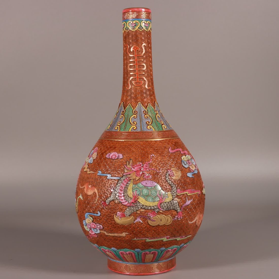 A Qing Qianlong enamel carved sauce glaze sea beast gallbladder bottle (1 of 9)