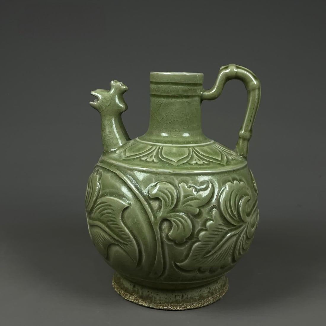 A Song Yaozhou kiln carved flower pattern phoenix head pot: Song Yaozhou kiln carved flower pattern phoenix head pot SIZE: H: 21cm W: 15cm (The Dimensions Of All Batches Are Manually Measured.If You Need More Detailed Information, Please Contact Our Customer S