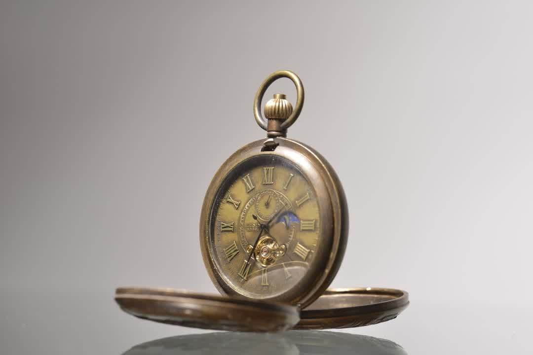 A brass embossed steam train mechanical pocket watch - 9