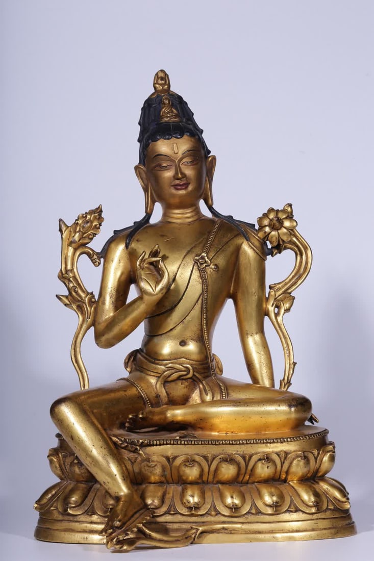 A seated statue of Tara, a bronze gilt green Tara, from the Qing Dynasty (1 of 10)