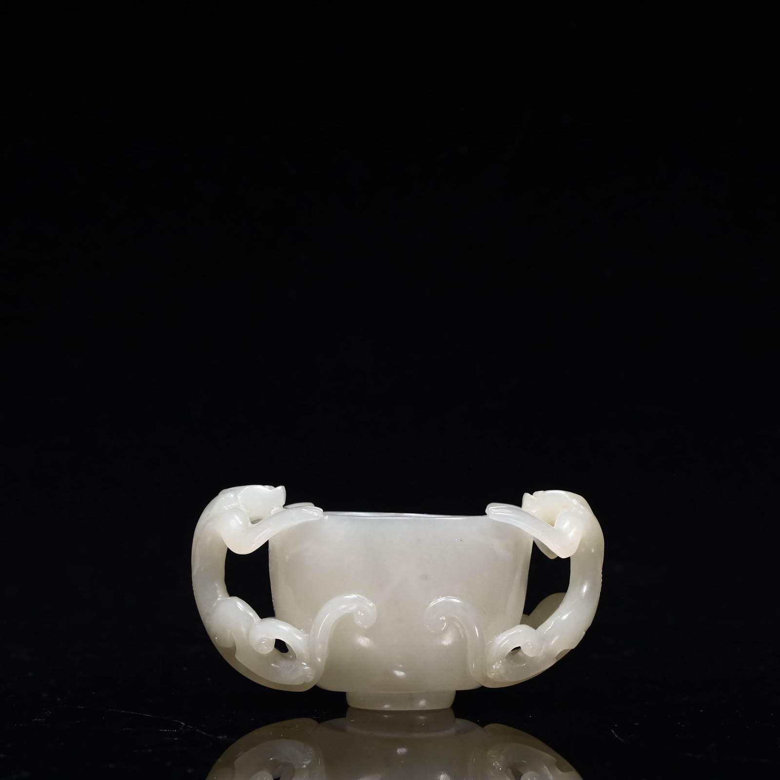 A Hetian jade wine glass: Hetian jade wine glass SIZE: L:9cm W:5cm H:4cm W:101G (The Dimensions Of All Batches Are Manually Measured.If You Need More Detailed Information, Please Contact Our Customer Service Before Bidding.)