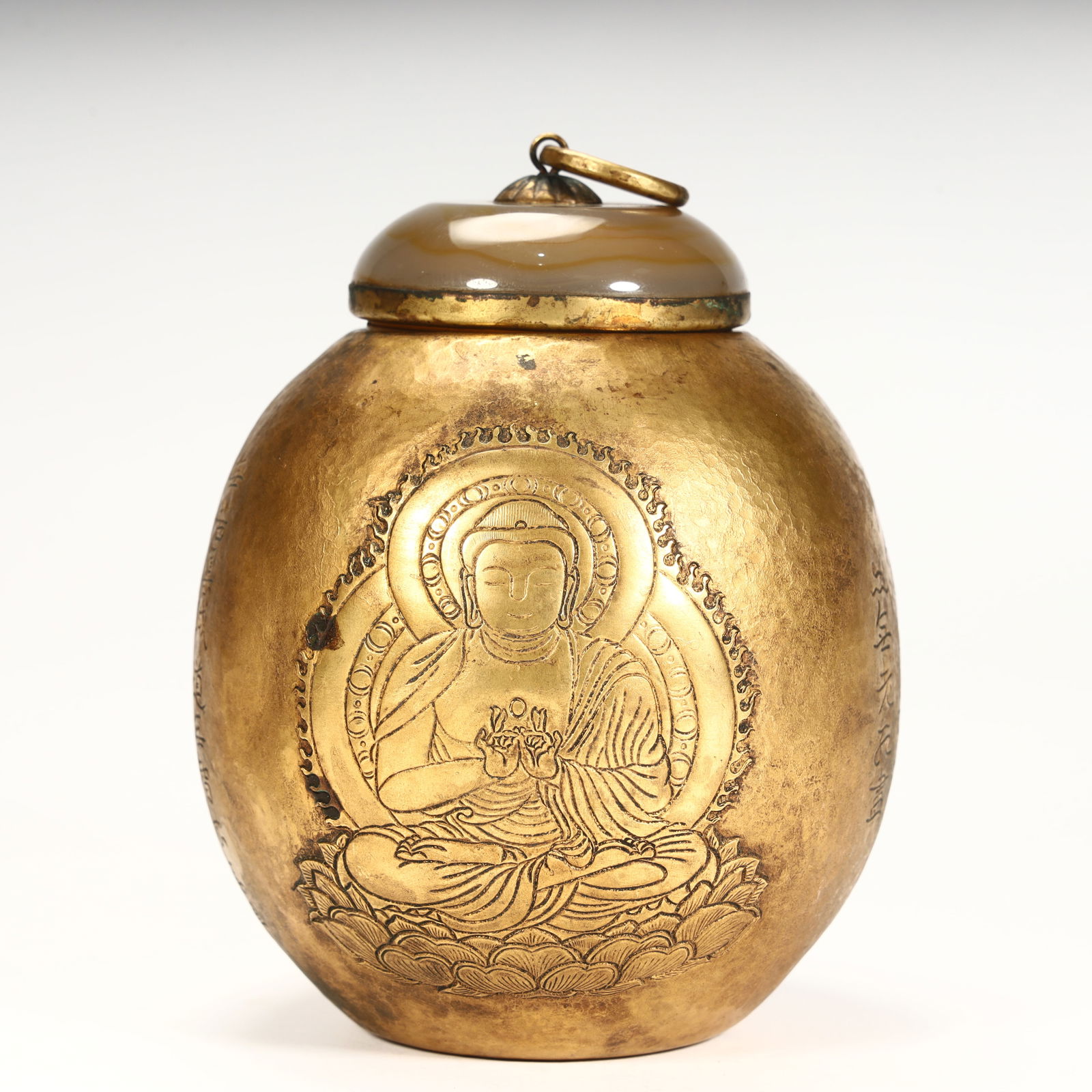 A Tang Dynasty copper gilt Buddha statue pattern lid jar (1 of 8)