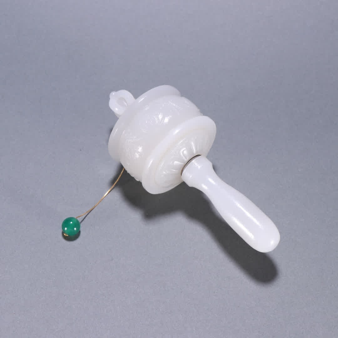 A Qing Dynasty Hetian jade prayer wheel: Qing Dynasty Hetian jade prayer wheel SIZE: L:13.5cm W:5.4cm W:192.6g (The Dimensions Of All Batches Are Manually Measured.If You Need More Detailed Information, Please Contact Our Customer Service Be