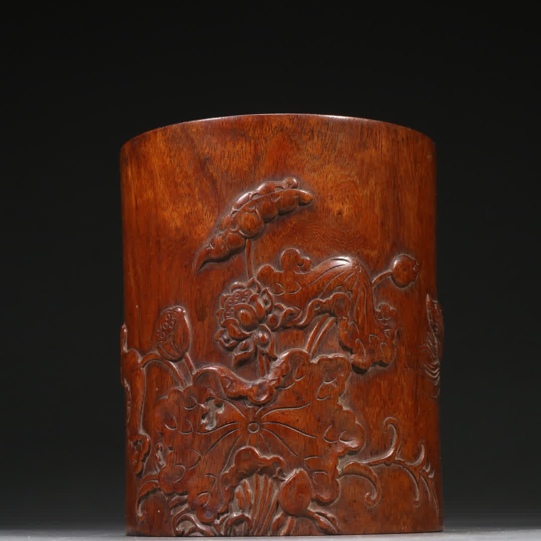 A Qing Dynasty yellow pear lotus leaf mandarin duck pattern pen holder: Qing Dynasty Huanghuali lotus leaf mandarin duck pattern pen holder SIZE: H:14.5cm W:12.3cm W:566.9g (The Dimensions Of All Batches Are Manually Measured.If You Need More Detailed Information, Please