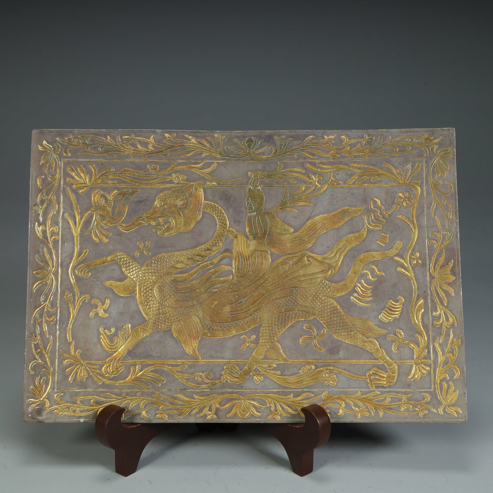 A Tang Dynasty silver-gilt immortal riding dragon pattern square board (1 of 9)