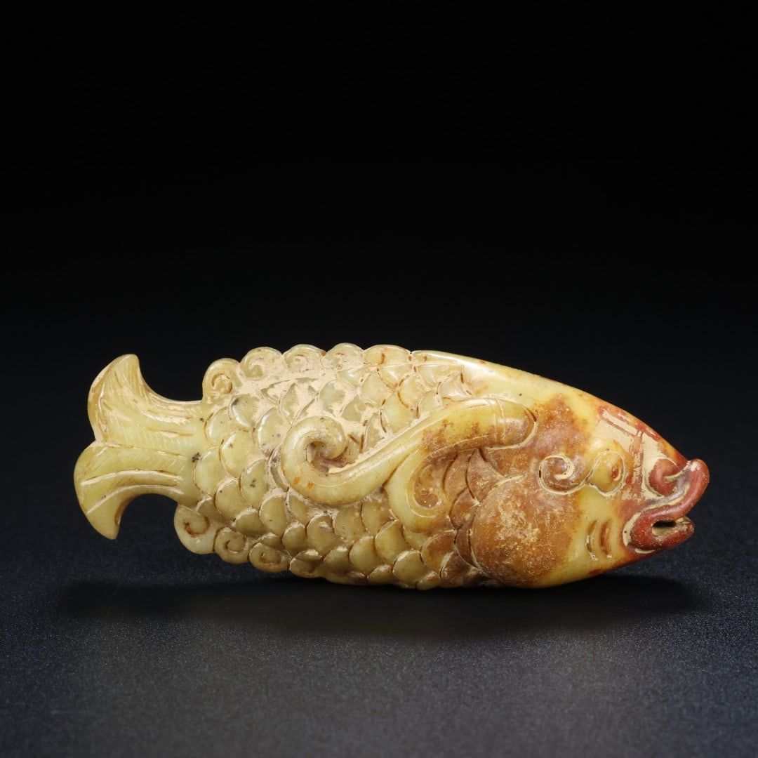 An Exquisite White Jade Fish Ornament (1 of 9)