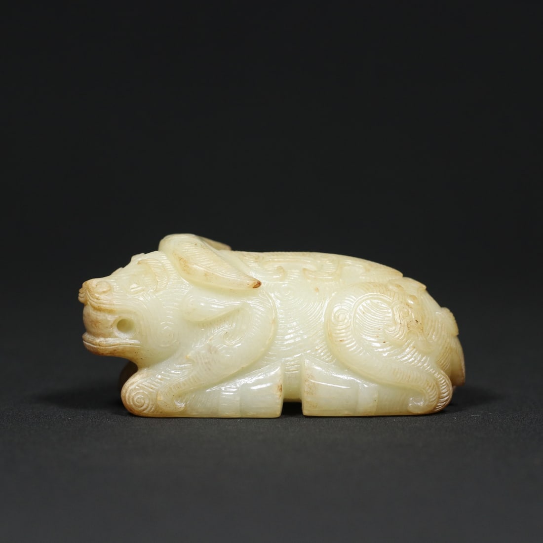 An Exquisite White Jade Buffalo Hand Piece (1 of 9)