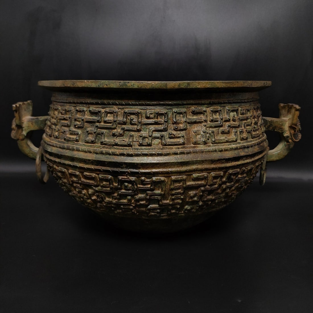 An Exquisite Bronze Dragon Pattern With Inscription Double-Ears and Tripod Basin (1 of 9)