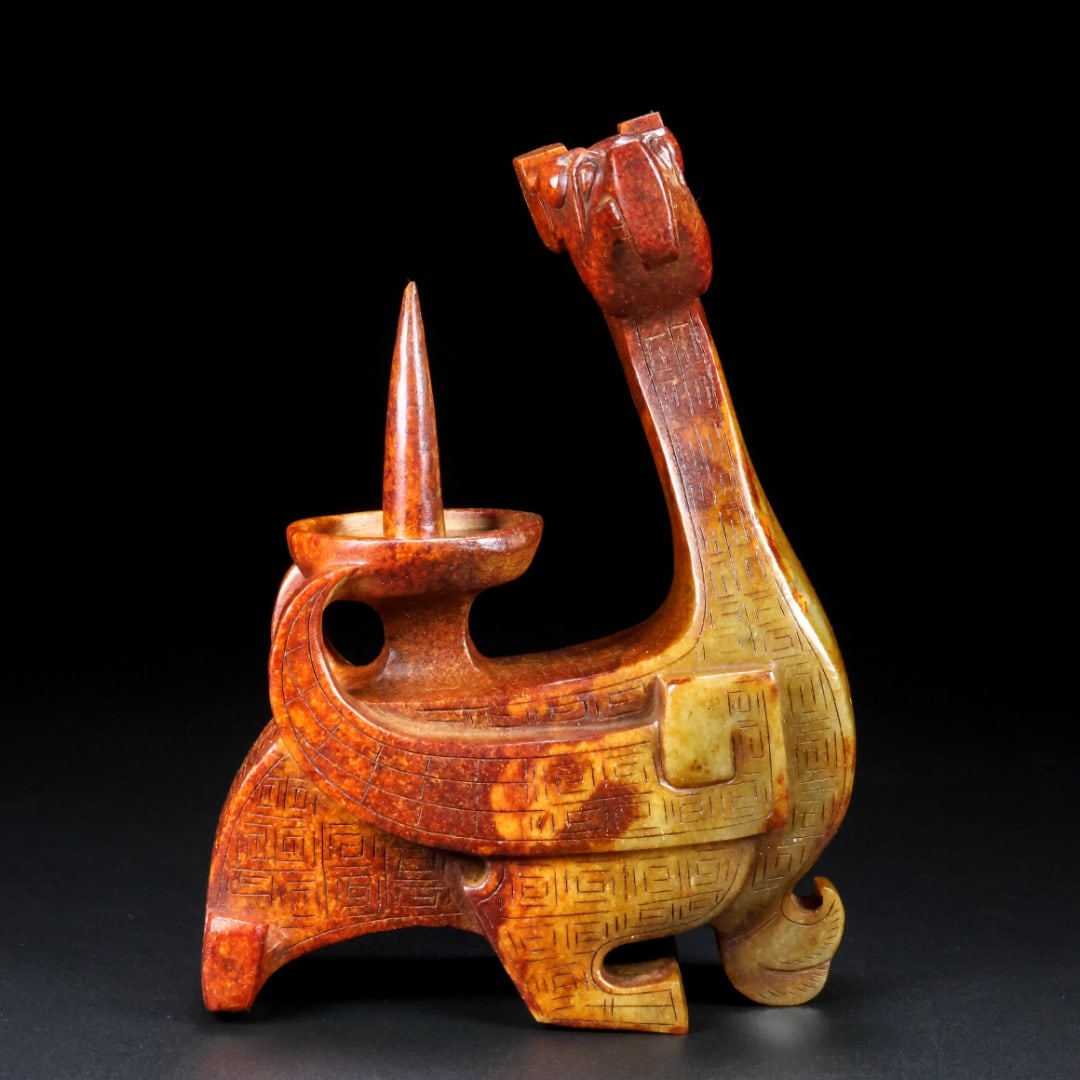 An Exquisite White Jade Phoenix-Shaped Candlestick: An Exquisite White Jade Phoenix-Shaped Candlestick Han Dynasty, China Size:17cmx13cmx5cm Weight:1.14kg (The Dimensions Of All Batches Are Manually Measured.If You Need More Detailed Information, Pleas