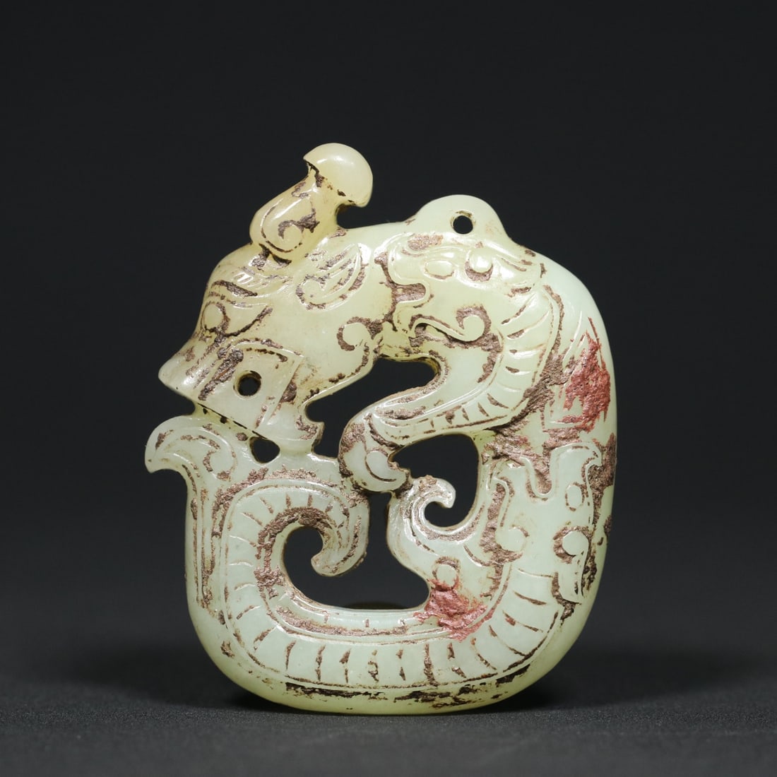 An Exquisite White Jade Dragon Pendant: An Exquisite White Jade Dragon Pendant Qing Dynasty, China Size:5.7cmx4.7cmx1.3cm Weight:55.6g (The Dimensions Of All Batches Are Manually Measured.If You Need More Detailed Information, Please Contac