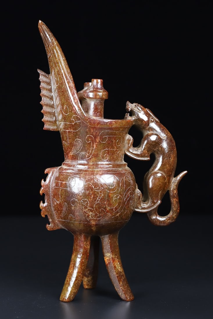 An Exquisite White Jade Phoenix Pattern Tripod Cup: An Exquisite White Jade Phoenix Pattern Tripod Cup Han Dynasty, China Size:21cmx11.2cmx6.2cm Weight:594g (The Dimensions Of All Batches Are Manually Measured.If You Need More Detailed Information, Ple