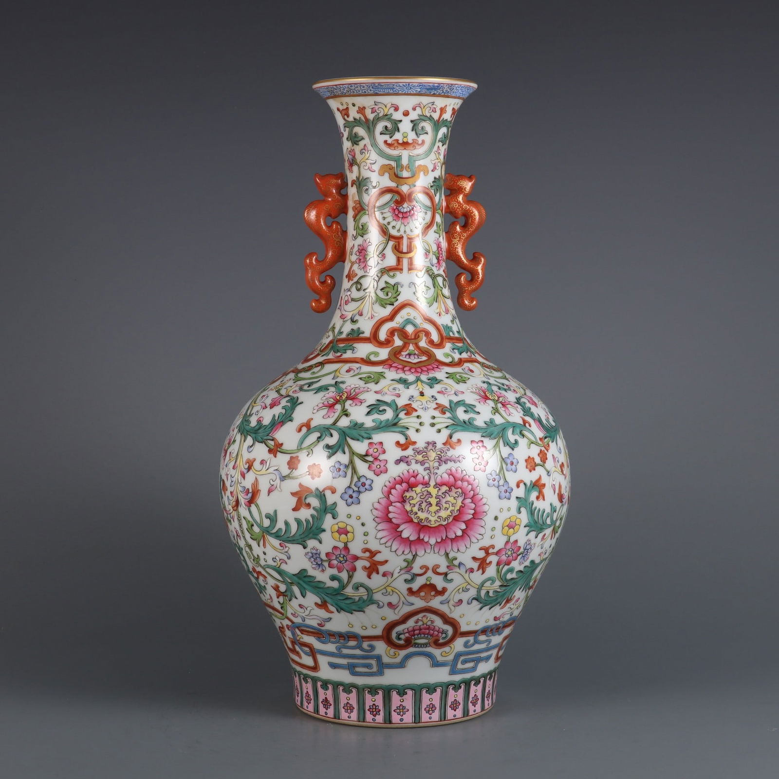 An Exquisite Famille-Rose Lotus Pattern Double-Ears Vase: An Exquisite Famille-Rose Lotus Pattern Double-Ears Vase Qing Dynasty, China Qianlong Six-character Mark Size:35.8cmx19.5cm (The Dimensions Of All Batches Are Manually Measured.If You Need More Detail