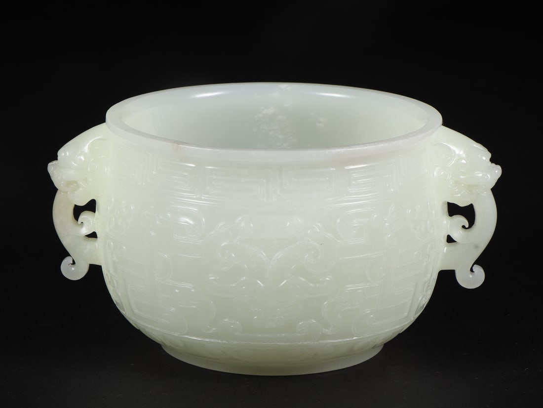 An Exquisite White Jade Beast-Face Pattern Double-Ears Censer: An Exquisite White Jade Beast-Face Pattern Double-Ears Censer Qing Dynasty, China Size:12.8cmx9.9cmx6.7cm Weight:366g (The Dimensions Of All Batches Are Manually Measured.If You Need More Detailed Inf