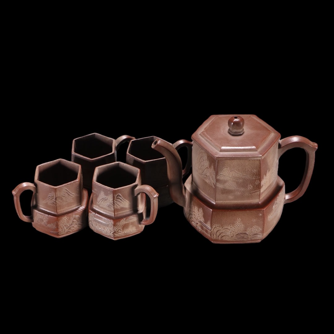 A Set of Fine Purple Sands Landscape Pattern Teapot: A Set of Fine Purple Sands Landscape Pattern Teapot Zhou ji shan Size1:11cmx14.5cm Size2:5.4cmx6.8cm (The Dimensions Of All Batches Are Manually Measured.If You Need More Detailed Information, Please
