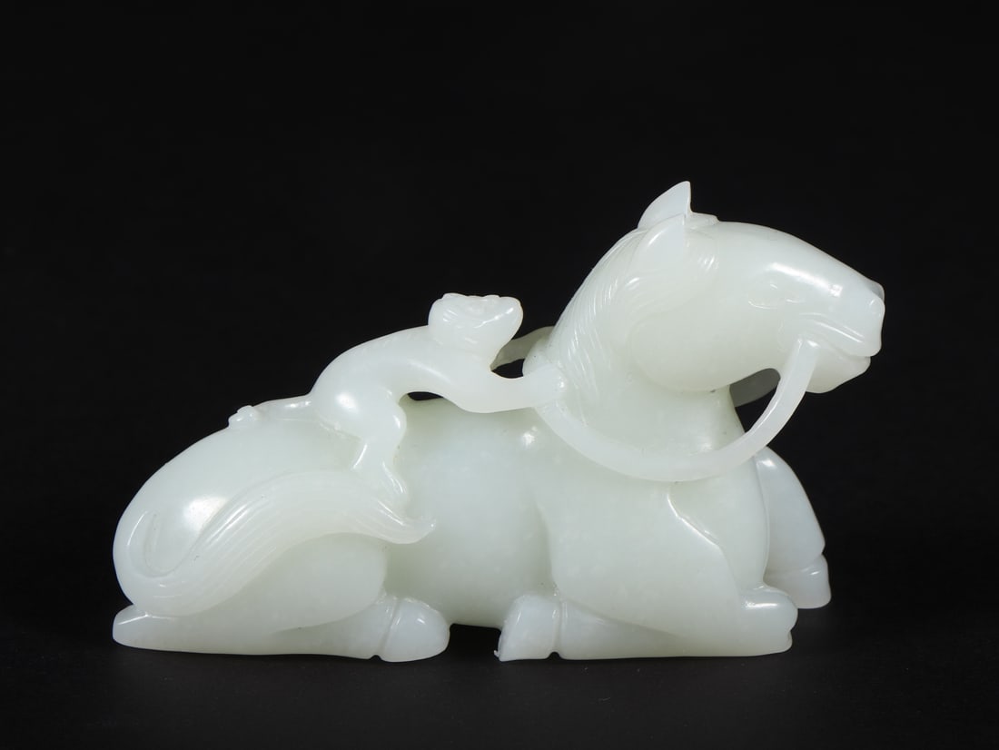 An Exquisite White Jade Horse Ornament (1 of 9)