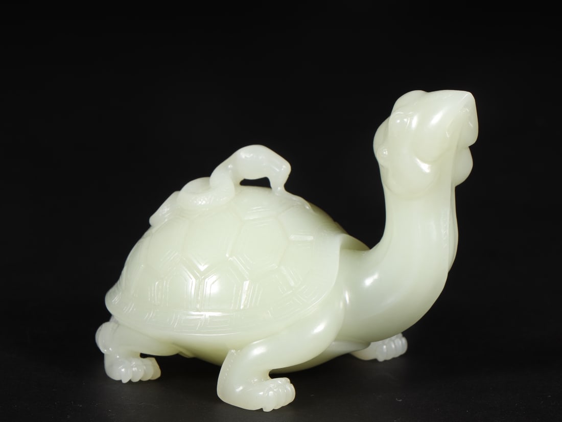 An Exquisite White Jade Auspicious Beast Ornament (1 of 9)