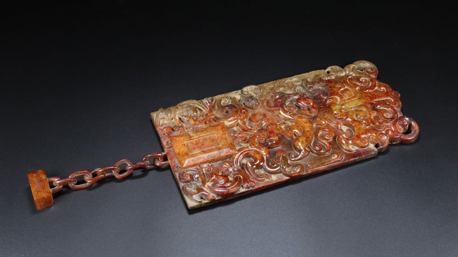 An Exquisite White Jade Beast-Face Pattern Chi-Dragon Pattern With Inscription Ornament: An Exquisite White Jade Beast-Face Pattern Chi-Dragon Pattern With Inscription Ornament Han Dynasty, China Size:39cmx13cmx1.4cm Weight:973g (The Dimensions Of All Batches Are Manually Measured.If You