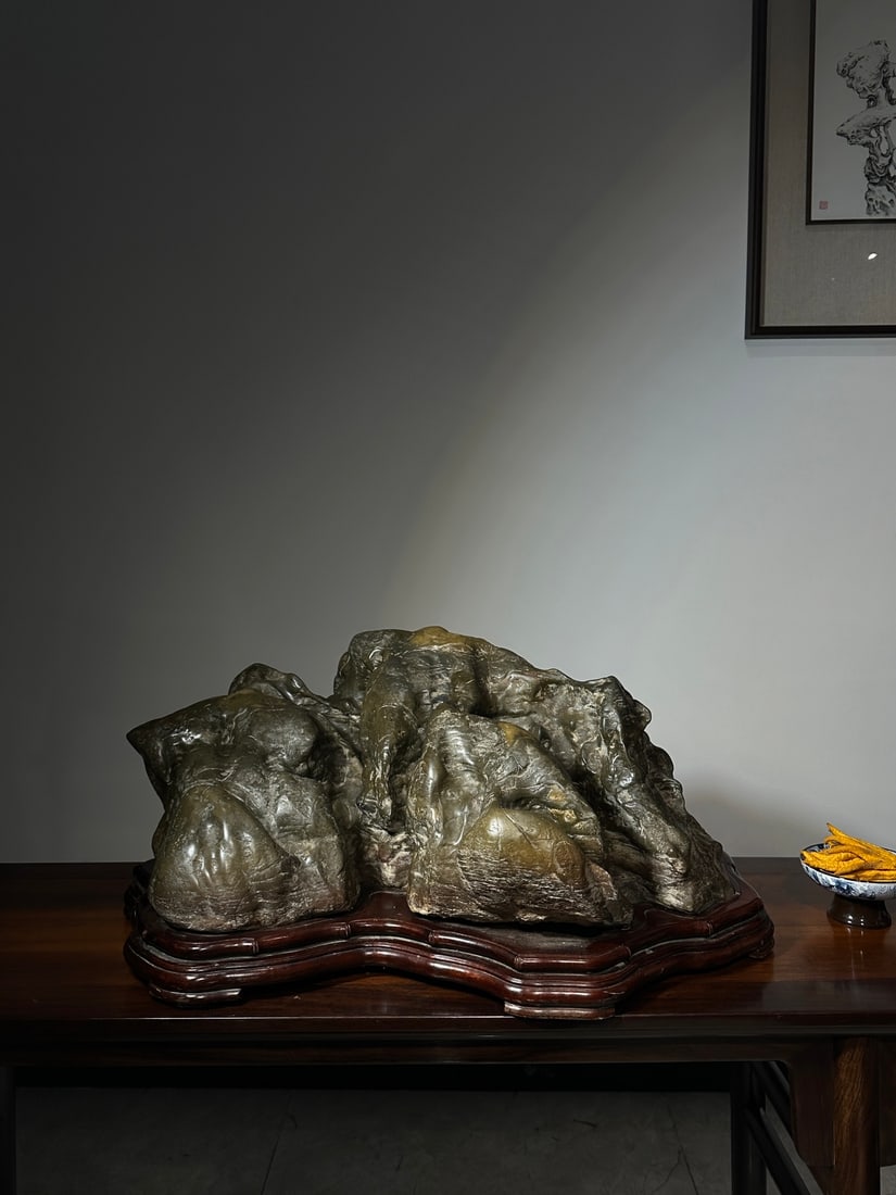 An Exquisite Lingbi Stone Rockery Ornament: An Exquisite Lingbi Stone Rockery Ornament Qing Dynasty, China Size:72cmx32cmx42cm (The Dimensions Of All Batches Are Manually Measured.If You Need More Detailed Information, Please Contact Our Custom