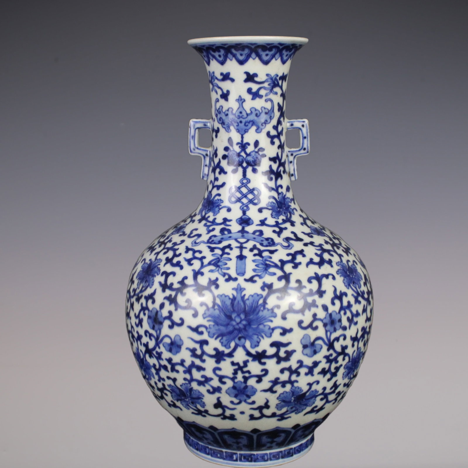 An Exquisite Blue and White Bats and Peach Pattern Lotus Pattern Double-Ears Vase: An Exquisite Blue and White Bats and Peach Pattern Lotus Pattern Double-Ears Vase Qing Dynasty, China Jiaqing Six-character Mark Size:29cmx9.5cm (The Dimensions Of All Batches Are Manually Measured.If