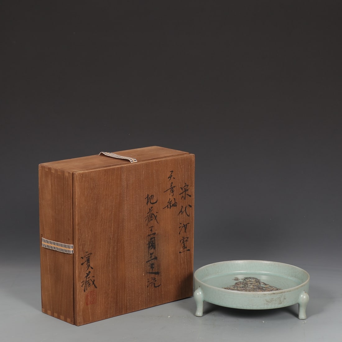 An Exquisite Ru yao Sky Blue Glazed Statue of Kshitigarbha Bodhisattva Pattern Tripod Brush Washer: An Exquisite Ru yao Sky Blue Glazed Statue of Kshitigarbha Bodhisattva Pattern Tripod Brush Washer Song Dynasty, China Size:5.7cmx18.5cm (The Dimensions Of All Batches Are Manually Measured.If You