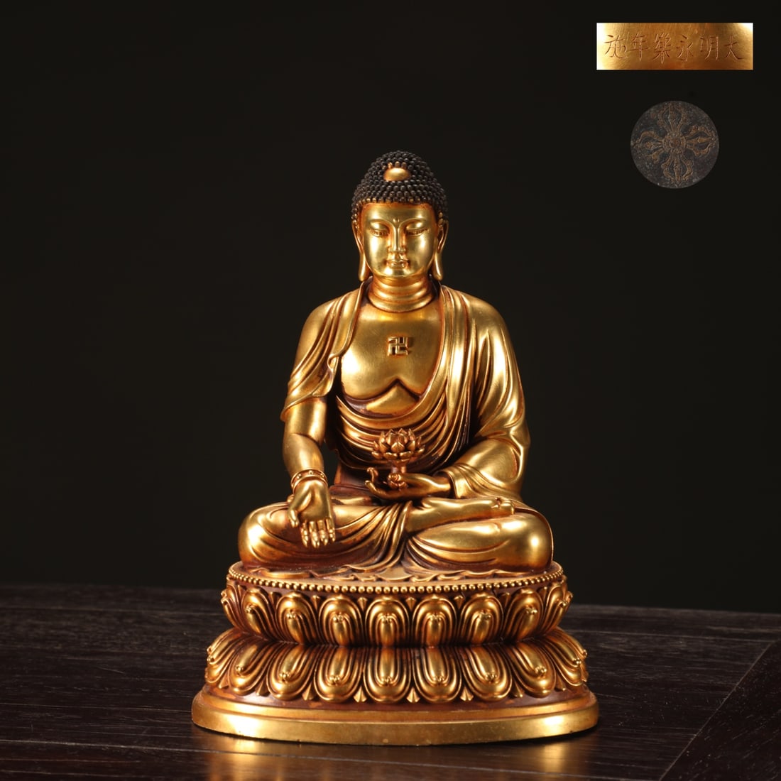 An Exquisite Gilt Bronze Buddha Statue: An Exquisite Gilt Bronze Buddha Statue Ming Dynasty, China Yongle Six-character Mark Size:16.5cmx11.6cm Weight:2.15kg (The Dimensions Of All Batches Are Manually Measured.If You Need More Detailed