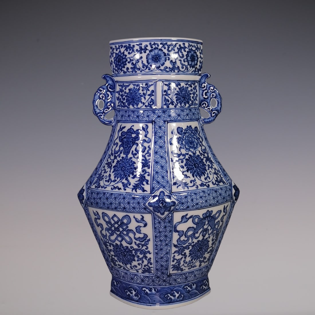 An Exquisite Blue and White Lotus Pattern Eight Treasures Pattern Double-Ears Vase: An Exquisite Blue and White Lotus Pattern Eight Treasures Pattern Double-Ears Vase Qing Dynasty, China Qianlong Six-character Mark Size:39.5cmx13.5cm (The Dimensions Of All Batches Are Manually Measur
