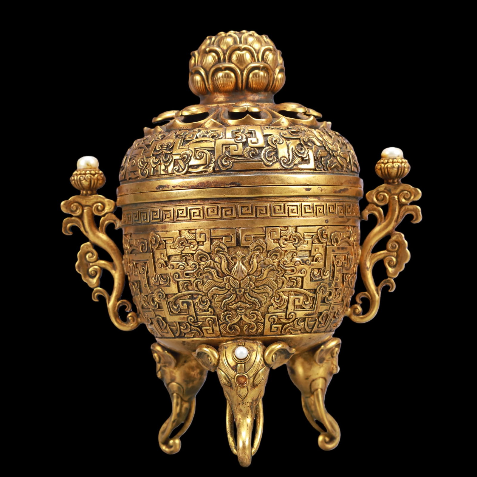 A Exquisite Gilt Bronze Inlaid Gems Lotus Pattern Double-Ears and Tripod Censer: A Exquisite Gilt Bronze Inlaid Gems Lotus Pattern Double-Ears and Tripod Censer Qing Dynasty, China Size:19cmx13cmx22cm Weight:1650g (The Dimensions Of All Batches Are Manually Measured.If You Need Mo