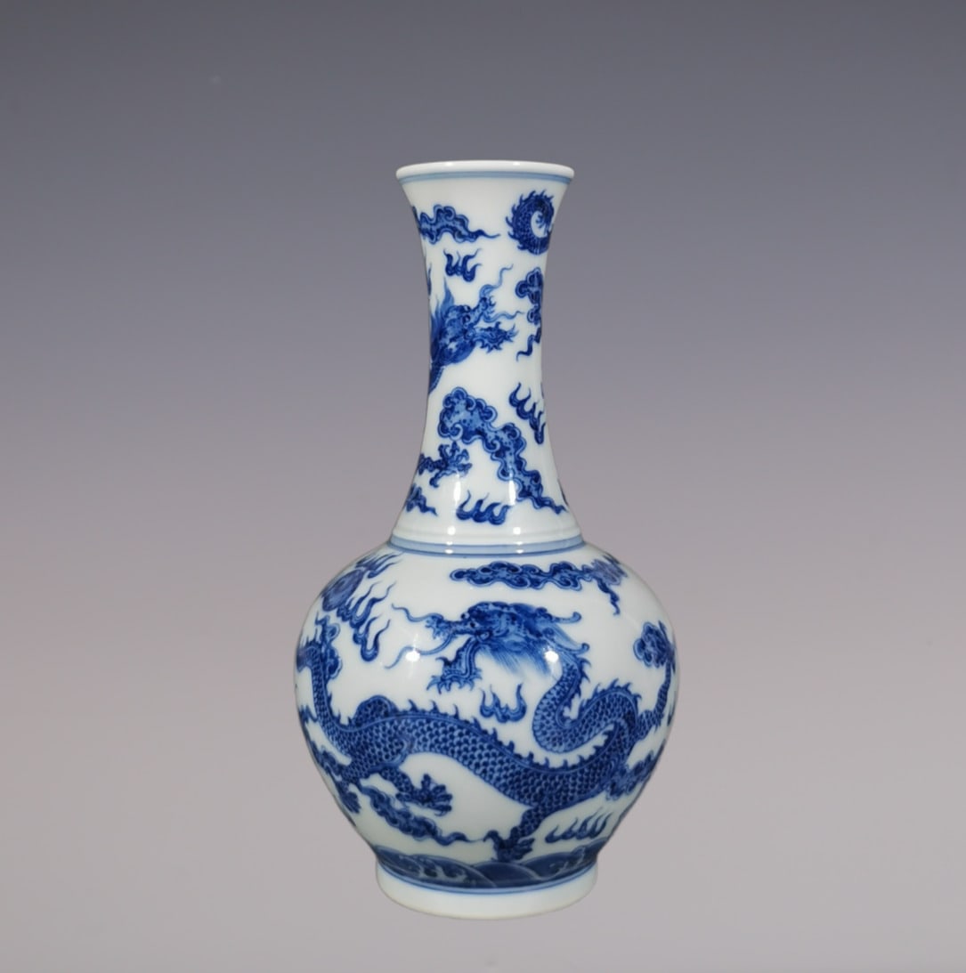 An Exquisite Blue and White Dragon Pattern Seawater Pattern Vase: An Exquisite Blue and White Dragon Pattern Seawater Pattern Vase Qing Dynasty, China Yongzheng Six-character Mark Size:18.4cmx10cm (The Dimensions Of All Batches Are Manually Measured.If You Need More