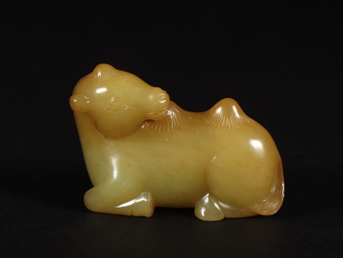 An Exquisite Yellow Jade Camel Ornament (1 of 9)