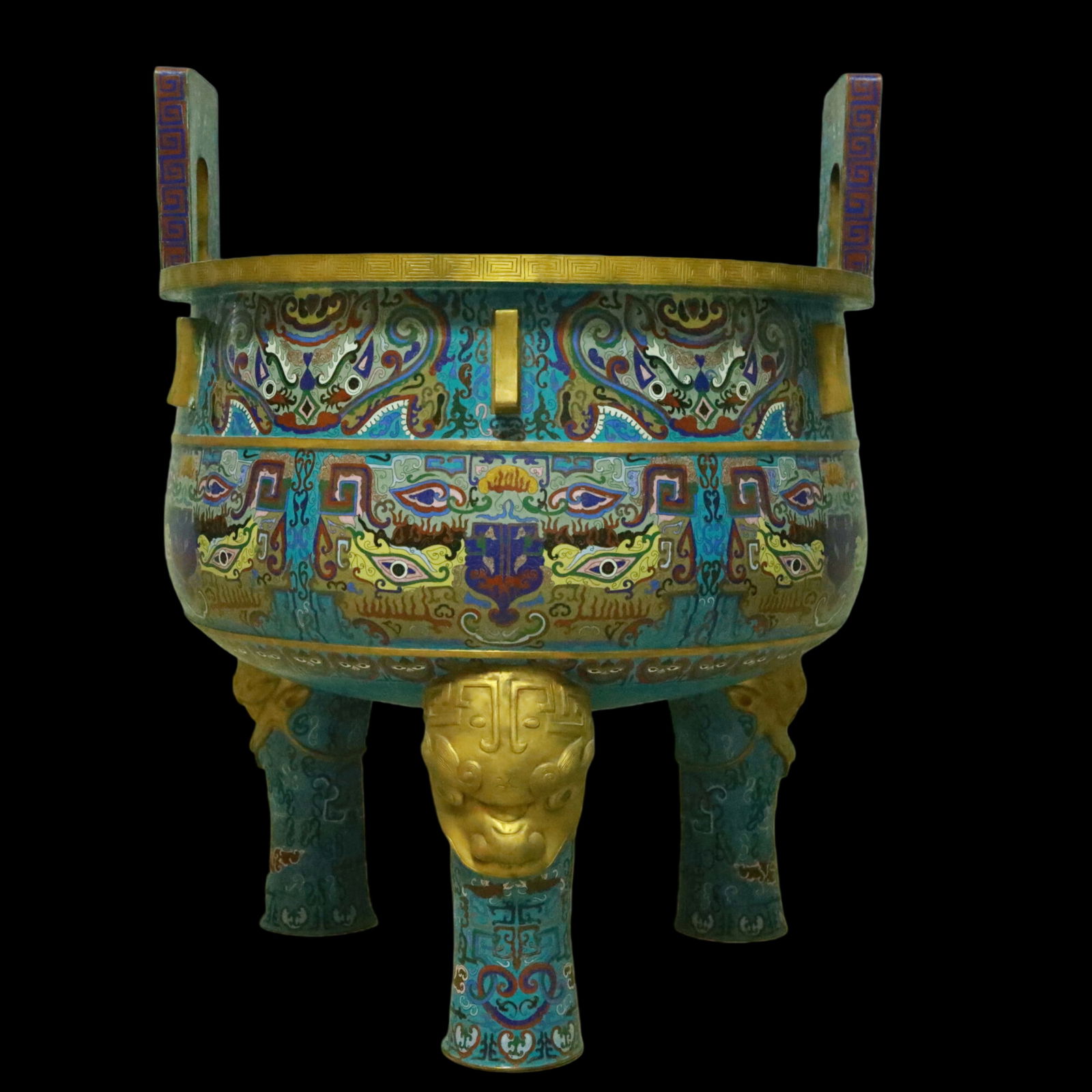 An Exquisite Cloisonne Beast-Face Pattern Double-Ears and Tripod Censer: An Exquisite Cloisonne Beast-Face Pattern Double-Ears and Tripod Censer Qing Dynasty, China Qianlong Four-character Mark Size:72cmx72cmx93cm (The Dimensions Of All Batches Are Manually Measured.If You