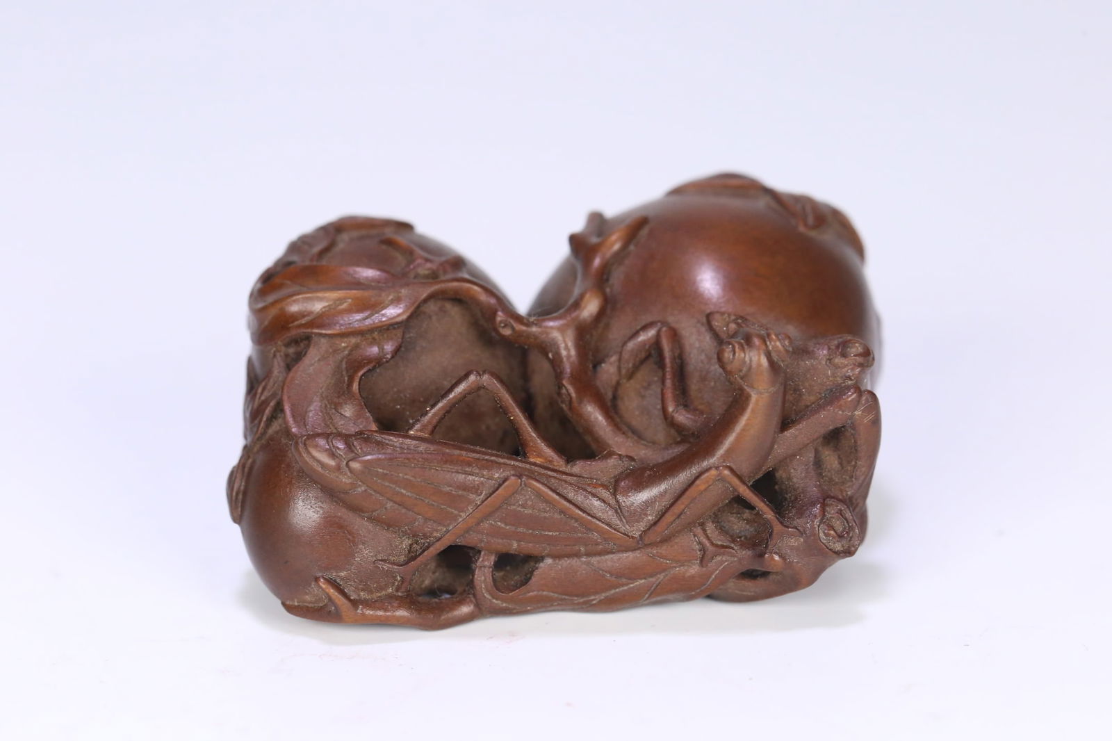 An Exquisite Boxwood Pomegranate Ornament: An Exquisite Boxwood Pomegranate Ornament Qing Dynasty, China Size:6.6cmx4.5cmx3.1cm Weight:37.5g (The Dimensions Of All Batches Are Manually Measured.If You Need More Detailed Information, Please Con